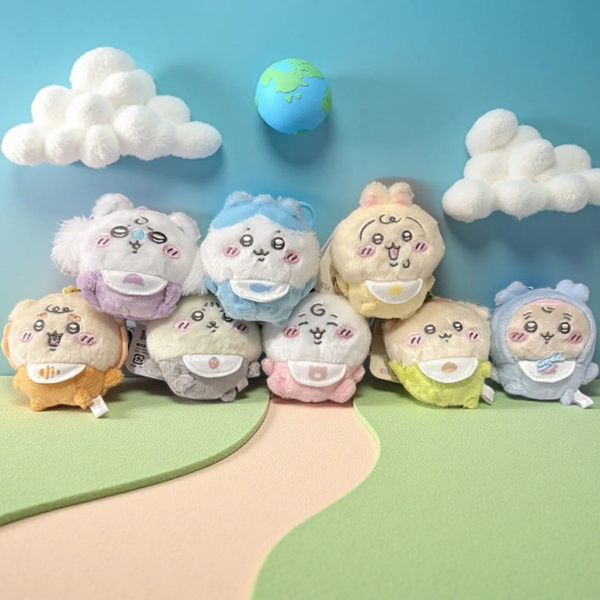 A set of kawaii plush keychains featuring characters resembling Usagi, Hachiware, and JiYi against a light blue background wi