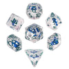 A set of polyhedral dice featuring a mushroom theme and translucent blue and green coloring.