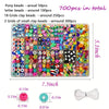 A plastic tray containing various pony beads, letter beads, and clay beads for jewelry making.