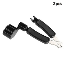 A pair of black tools used for guitar string winding, cutting, and pin pulling.