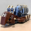 A LEGO set featuring a robot platoon and transport warship model built from dark brown, blue, and gray bricks.