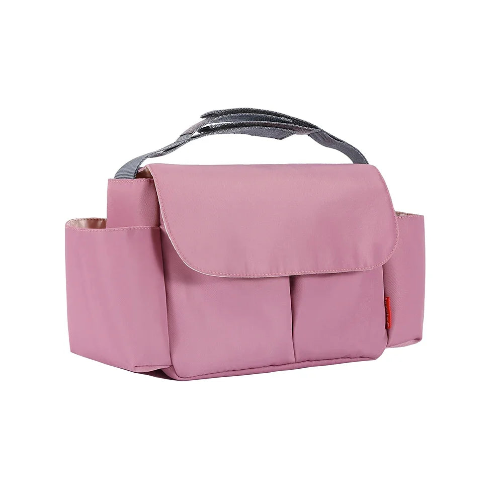 A pink fabric bottle and cup holder designed for strollers.