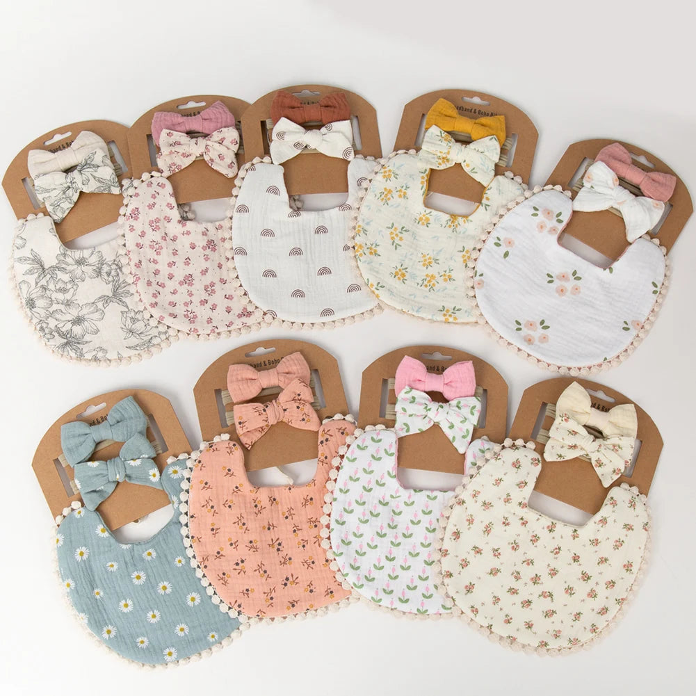 A set of three baby flower bibs and headbands in various floral patterns and colors