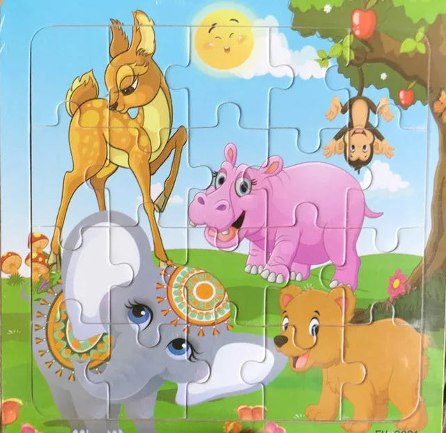 A jigsaw puzzle featuring cartoon animals including a deer, a pink elephant, and a lion cub on a green background.