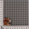 A grid of small building blocks featuring various food items like pizza, cake, and condiment designs.