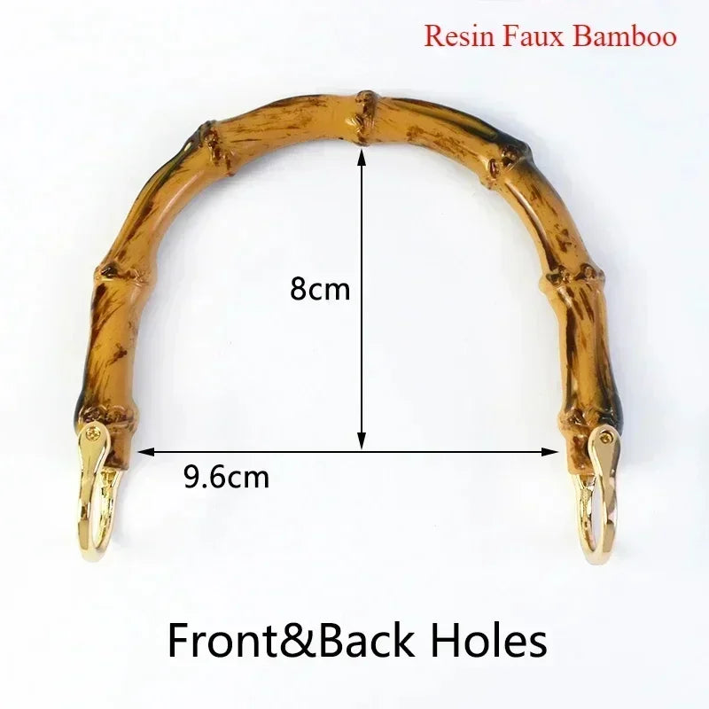 A curved resin faux bamboo handle with front and back holes for DIY bag projects.