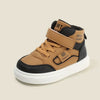 A pair of tan and black high-top sneakers with brown leather accents and white soles.