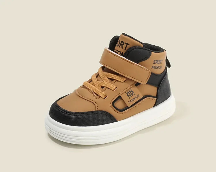 A pair of tan and black high-top sneakers with brown leather accents and white soles.