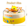 A yellow duck toy with friends sitting on a round white base for reflex training.
