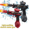 A black and red light-emitting electric water gun is shown firing a stream of water.