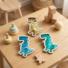 Wooden sensory activity board featuring a glittery map of England and wooden puzzle pieces for toddlers