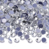 A pile of clear and purple glass crystal rhinestones for DIY crafts and decor