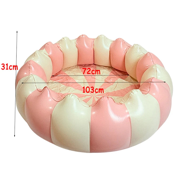 An inflatable round toddler pool with a pink and cream striped design, showing dimensions of 31cm, 72cm, and 103cm.