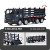 A black pull-back container truck toy for kids with a wooden crate and cargo area.