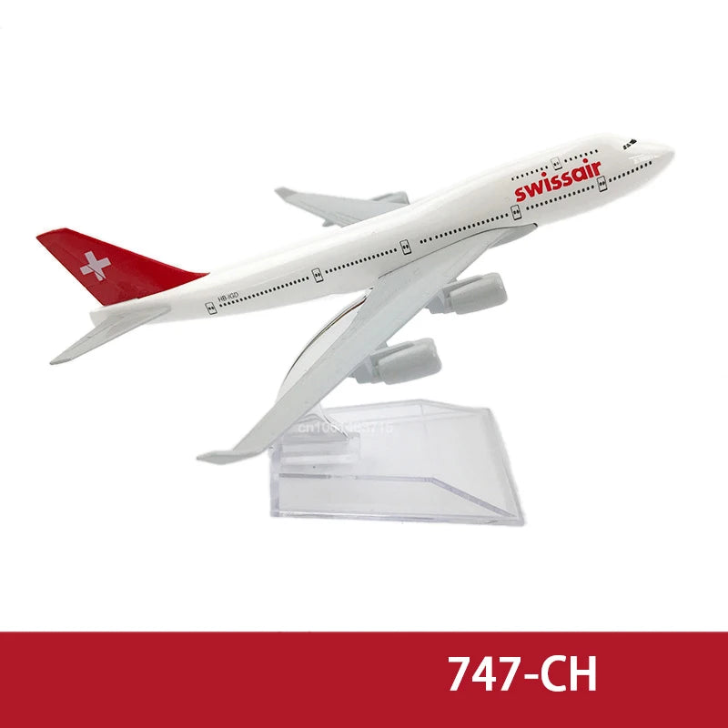 A white diecast model of a Swissair airplane with red markings and a clear stand.