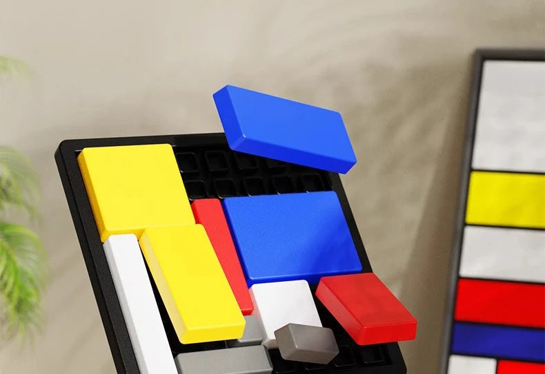 A black puzzle tray filled with colorful geometric blocks in yellow, blue, red, and white.