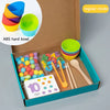 A box containing ten colorful plastic bowls and wooden tools for a Montessori clip beads sorting toy