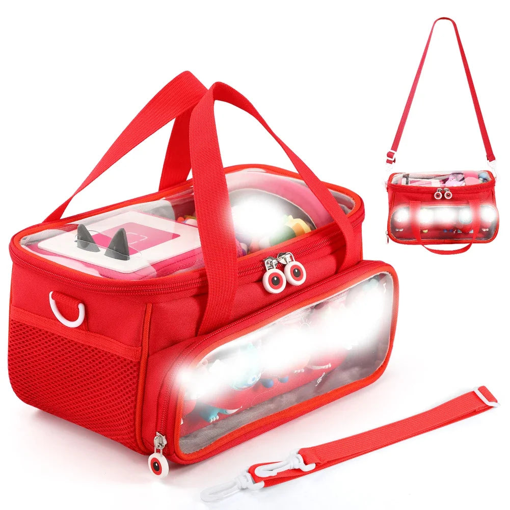 A red Toniebox travel case with an adjustable strap and built-in light is shown with an attached carrying strap.