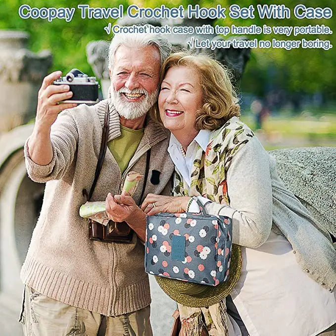 An elderly couple smiling while holding a crochet hook set with a case outdoors.