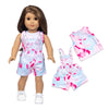 A doll wearing a pink and blue tie-dye outfit consisting of a sleeveless top and shorts.