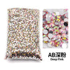 Bag of deep pink flat-back resin rhinestones for DIY craft and nail art