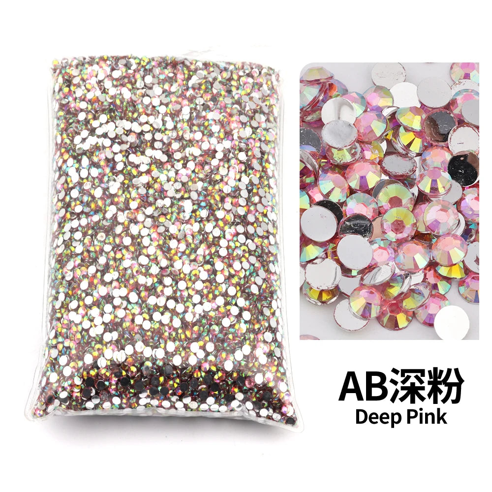 Bag of deep pink flat-back resin rhinestones for DIY craft and nail art