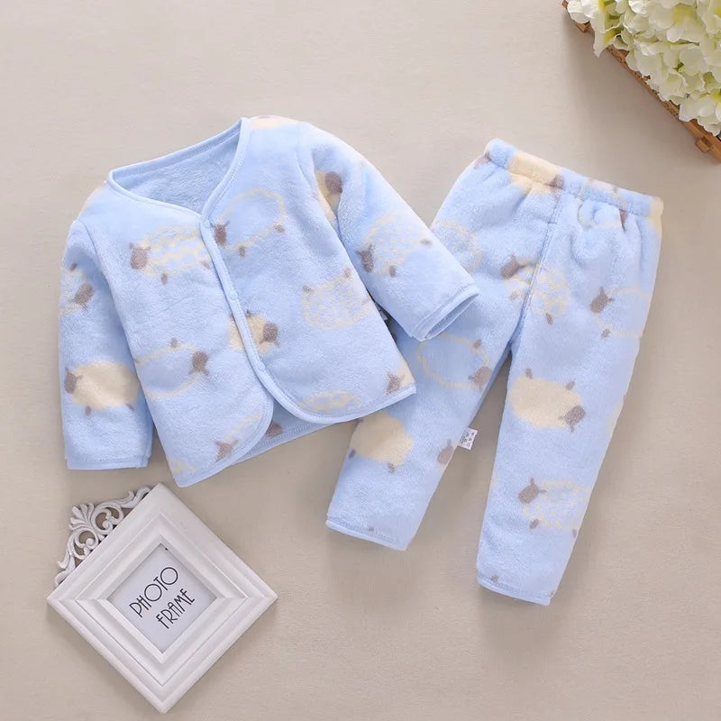 Light blue fleece jacket and pants set for baby with a cartoon print