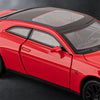 A red Dodge Challenger SRT Hellcat diecast model car viewed from the side with the door open.