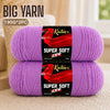 Two skeins of super soft red acrylic yarn are displayed on a light background.