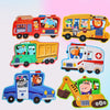 A collection of colorful toy vehicles including a fire truck, school bus, truck, ambulance, and police car.