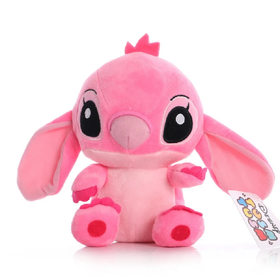 A pink Kawaii plush figurine of a donkey character with large eyes and floppy ears.