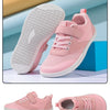 Pink minimalist barefoot sneakers for kids shown from various angles