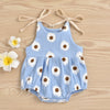 Light blue cotton romper for a baby girl with a white daisy floral print and adjustable ties
