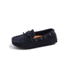 A dark navy girls' slip-on moccasin shoe with a bow detail and metal hardware.