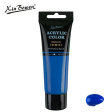 A tube of Xin Bowen Acrylic Color in Phthalo Blue paint with a small swatch of the blue color.