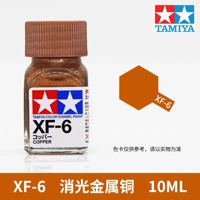 Tamiya Color Enamel Paint set labeled XF-6 Copper, a 10ml bottle of gold-colored paint.