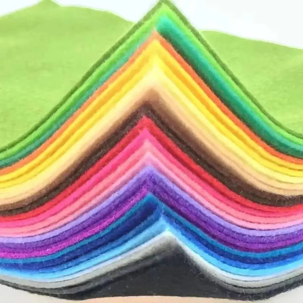 A fan of vibrant felt fabric sheets arranged in a colorful chevron pattern.
