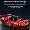 A red streamlined hypercar model is shown in motion, emphasizing smooth design and performance.