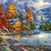 A scenic forest house with a wooden deck and cabin sits beside a flowing river surrounded by vibrant autumn foliage and mount