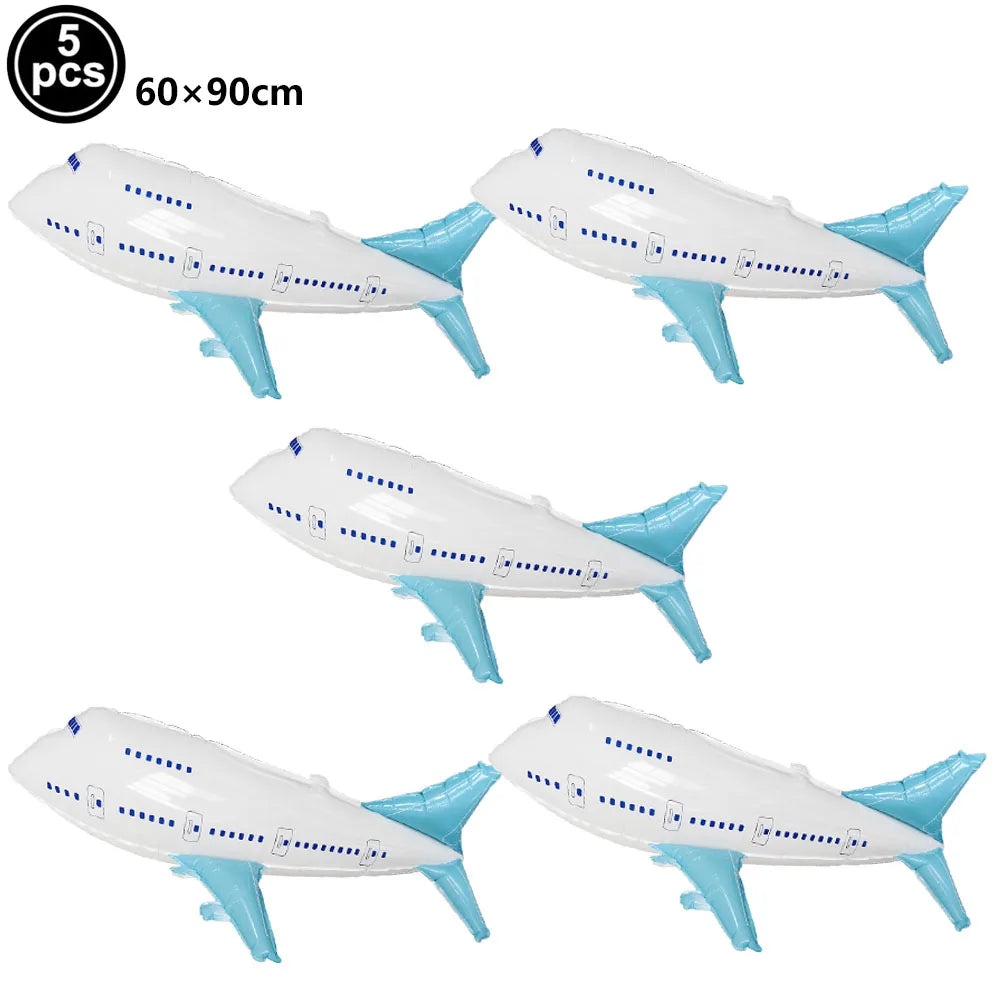 Five white and blue foil balloon airplane decorations for birthday parties