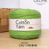 A ball of bright green 100% cotton yarn labeled Cotton Yarn for knitting and crochet.