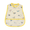 A light yellow baby bib featuring a cartoon pattern of various animals like elephants, dogs, and birds.