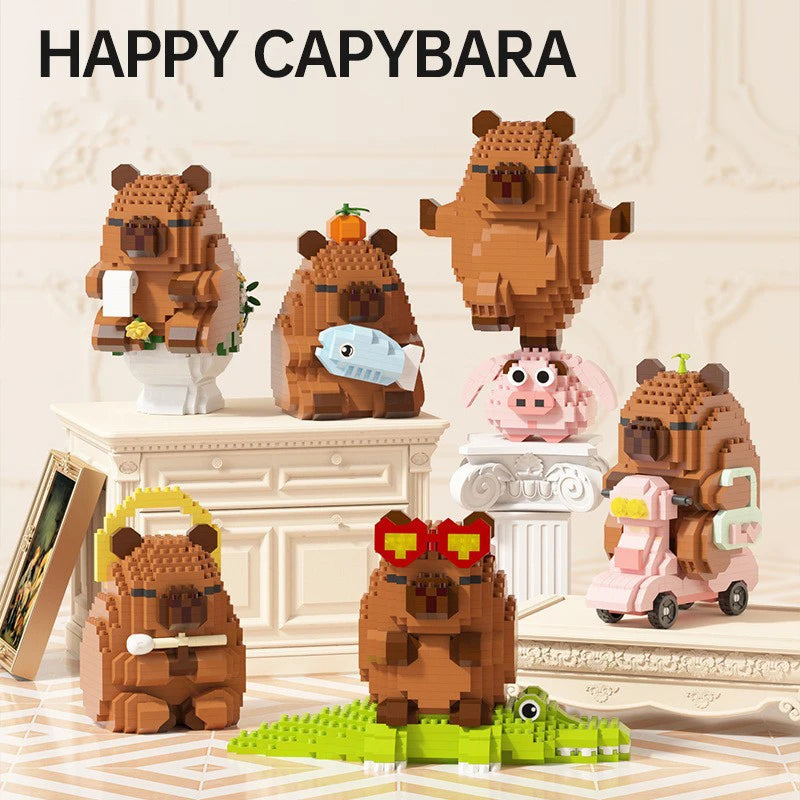A collection of cute capybara figures made from brown and pink building blocks displayed on a white surface.