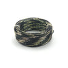 A coil of flexible black and gold aluminum craft wire for jewelry making and DIY projects.