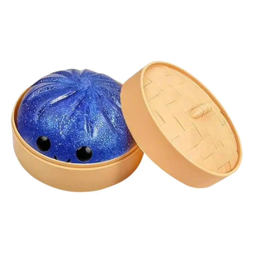 A glittery blue sensory compress toy in a light brown container with an open lid.