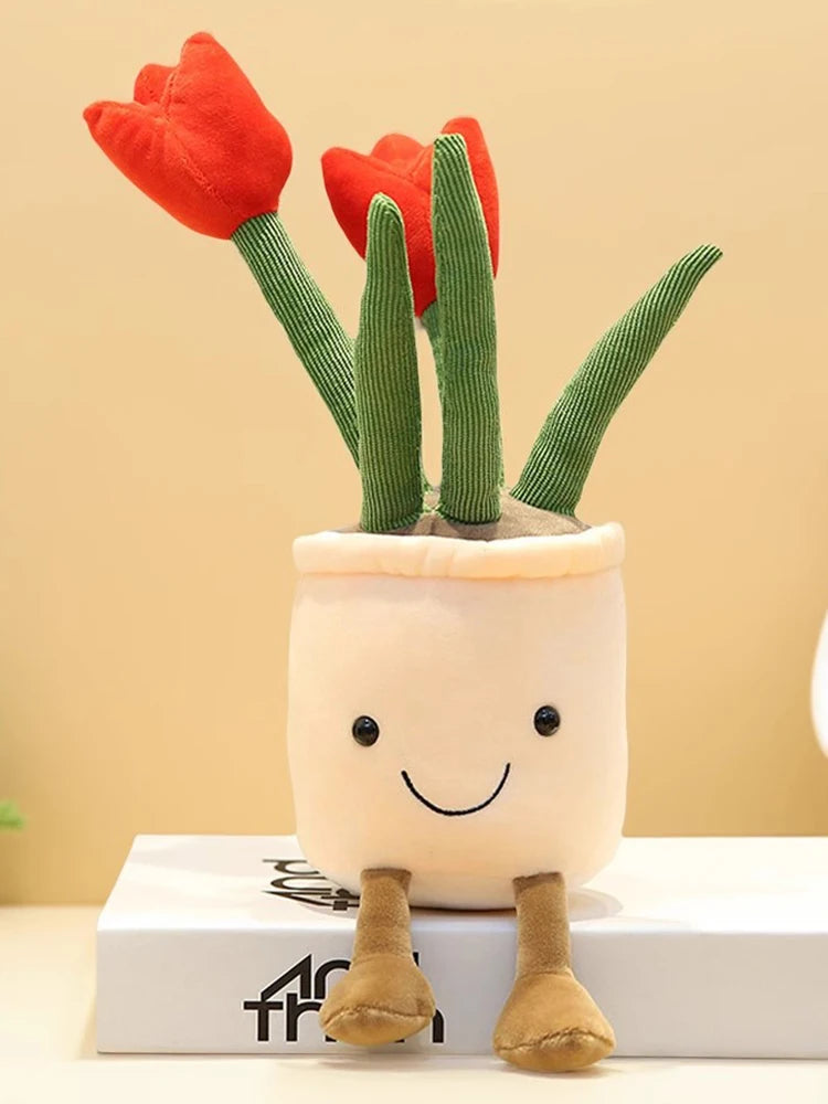 A cute plush toy of a tulip succulent with green stems and a smiling face, sitting in a white pot.