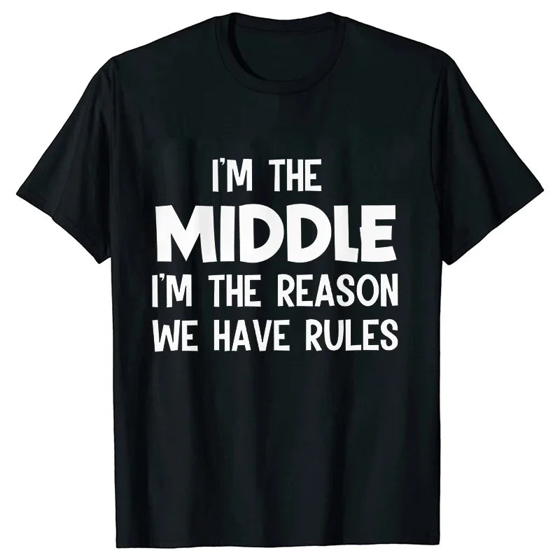 Black t-shirt with white text that reads I'm the middle I'm the reason we have rules