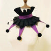 A handmade colorful clown ruff collar accessory displayed on a mannequin.