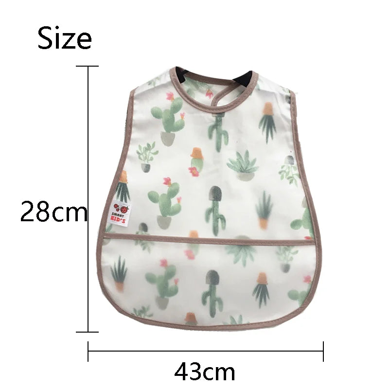 A white baby bib with a green cactus pattern and a brown trim.