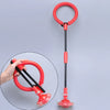A red glowing skip ball with a handle and float is shown next to a hand for scale.